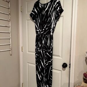 Jumpsuit, no size tag but I’m guessing a L/XL.